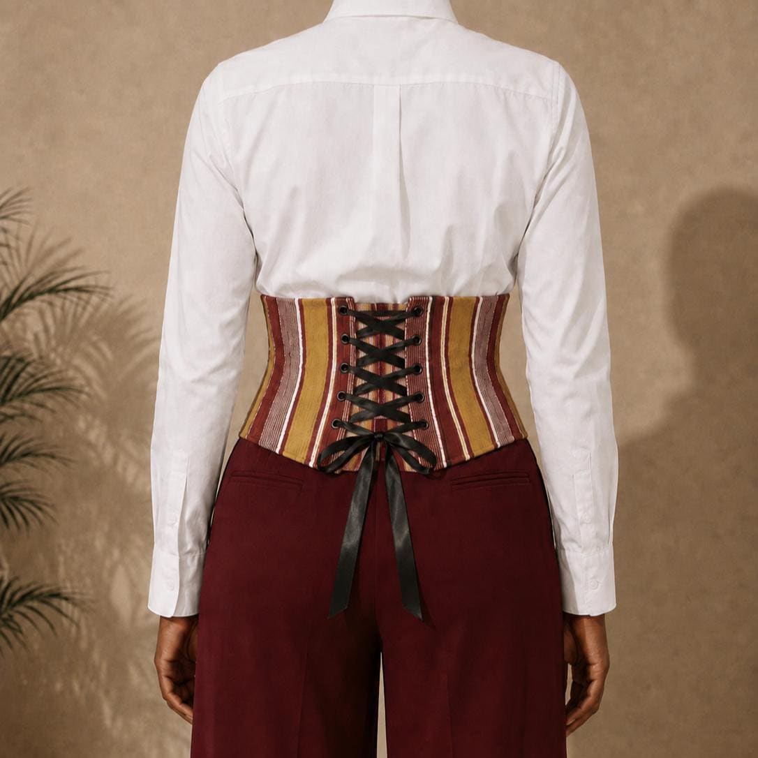 Mustard, burgundy and white Aso Oke corset belt worn over a white shirt, view 3