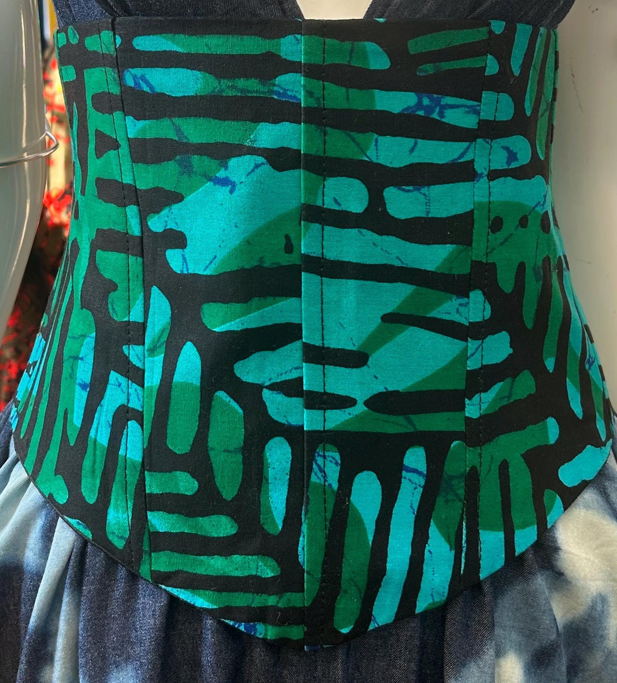 Turquoise and black African print corset belt with lace-up back, view 3