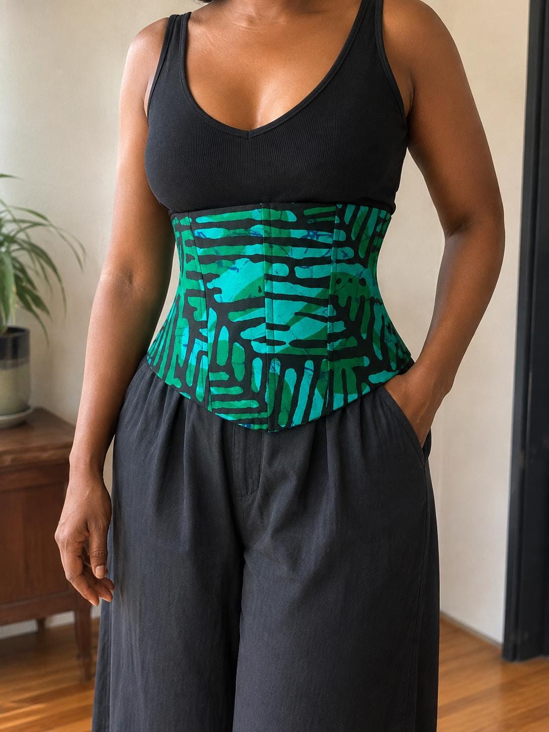 Turquoise and black African print corset belt with lace-up back, view 2